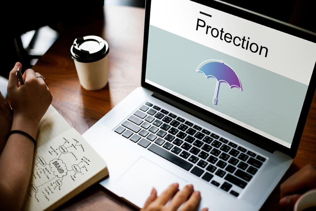 Image illustrating strategies to safeguard a business against cyber attacks, featuring security icons and protective measures.